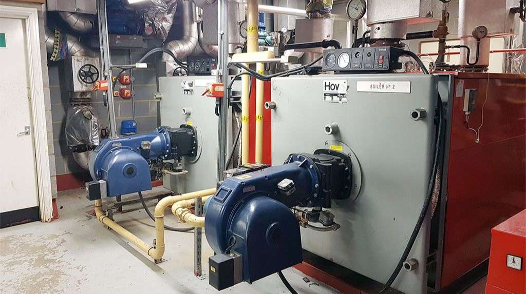 Photo of Connor working on a Viessmann Boiler Installation in Newbury